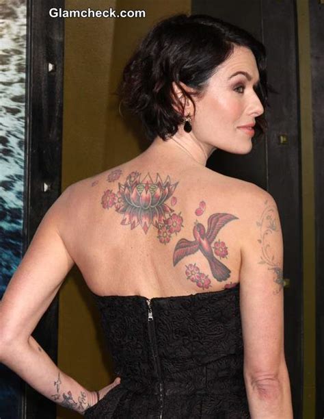 Game Of Thrones star Lena Headey shows off HUGE back tattoo。